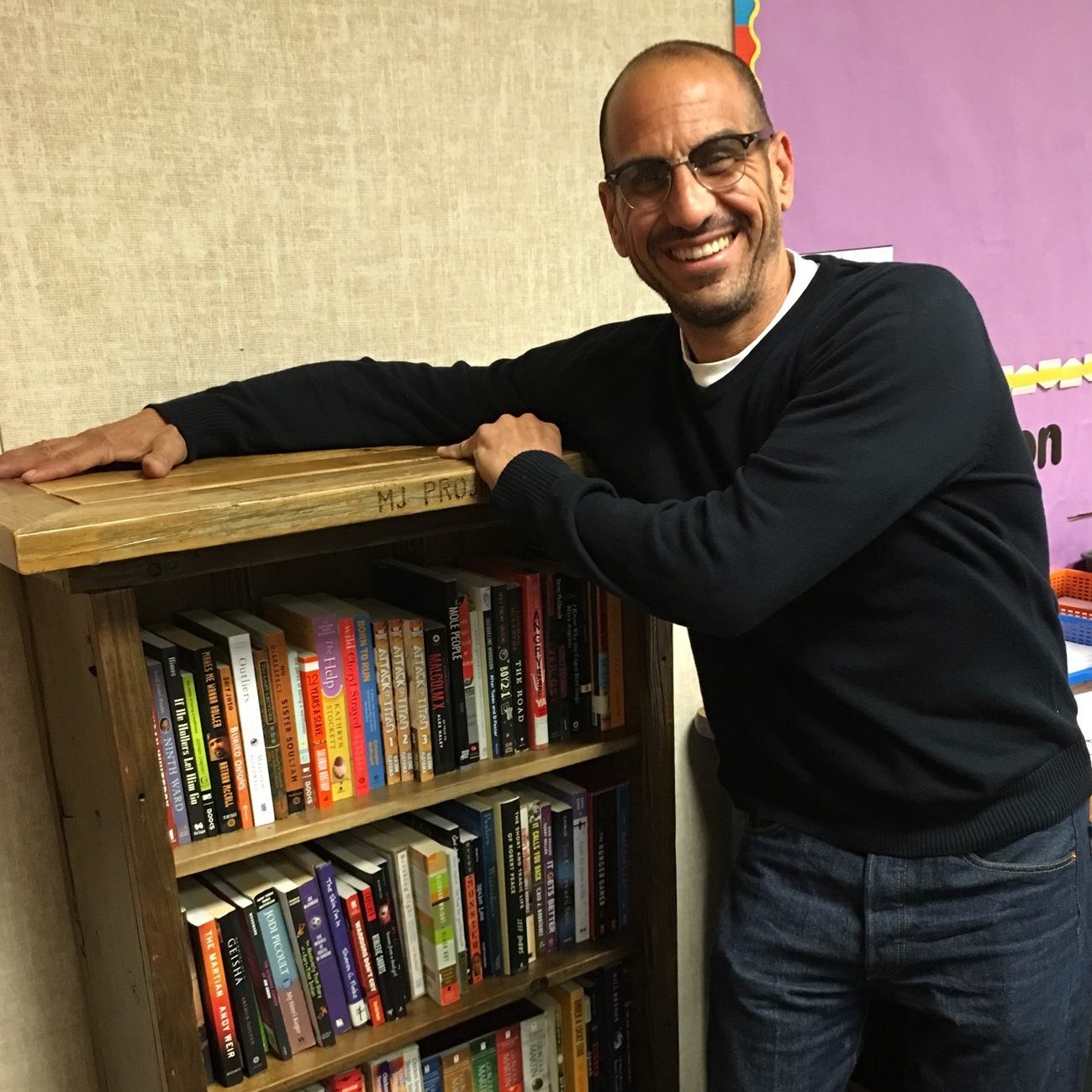 teacher hugging library